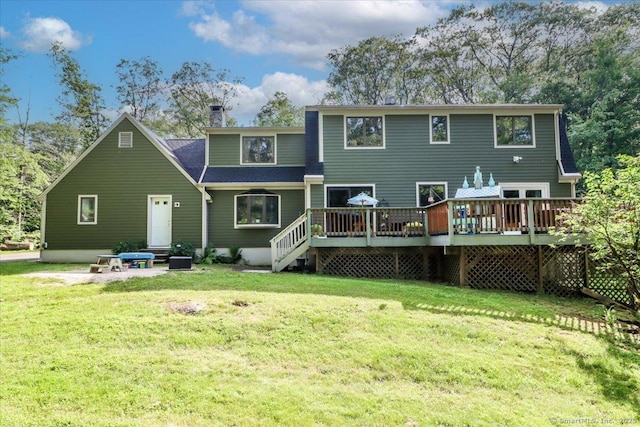 52 Dick Finn Rd, New Fairfield, CT 06812 - back of house featuring a wooden deck, a chimney, and a yard
