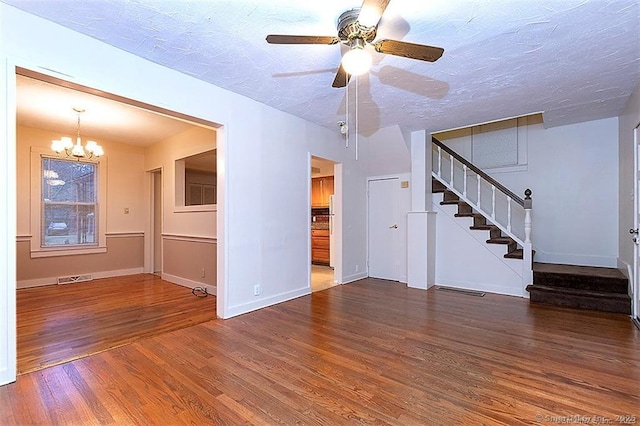 37 Landin St, Woodbridge, CT 06525 - unfurnished living room featuring stairs, wood finished floors, a ceiling fan, a chandelier, and a textured ceiling