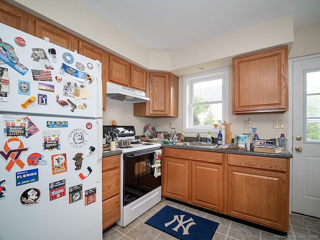 37 Landin St, Woodbridge, CT 06525 - kitchen with white appliances, under cabinet range hood, dark countertops, and healthy amount of natural light