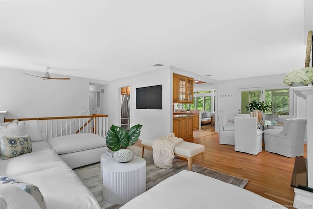 20 Aspen Mill Rd, Ridgefield, CT 06877 - living area with light wood-style flooring and ceiling fan