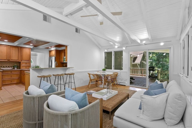 20 Aspen Mill Rd, Ridgefield, CT 06877 - living area featuring a wainscoted wall, light wood finished floors, ceiling fan, and baseboard heating