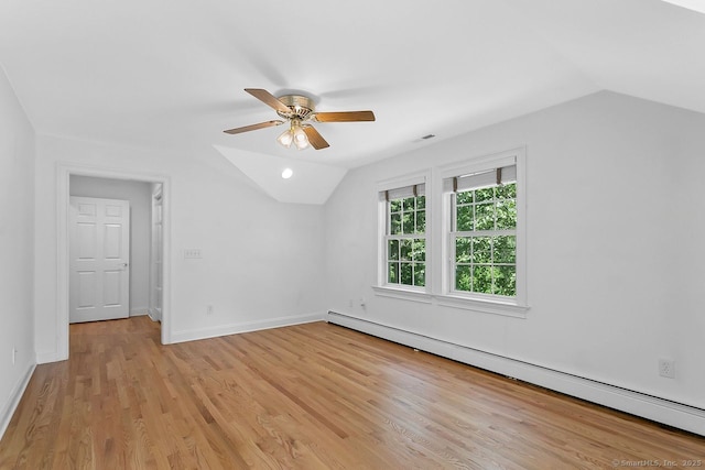 20 Aspen Mill Rd, Ridgefield, CT 06877 - additional living space featuring baseboard heating, vaulted ceiling, ceiling fan, and light wood-style flooring