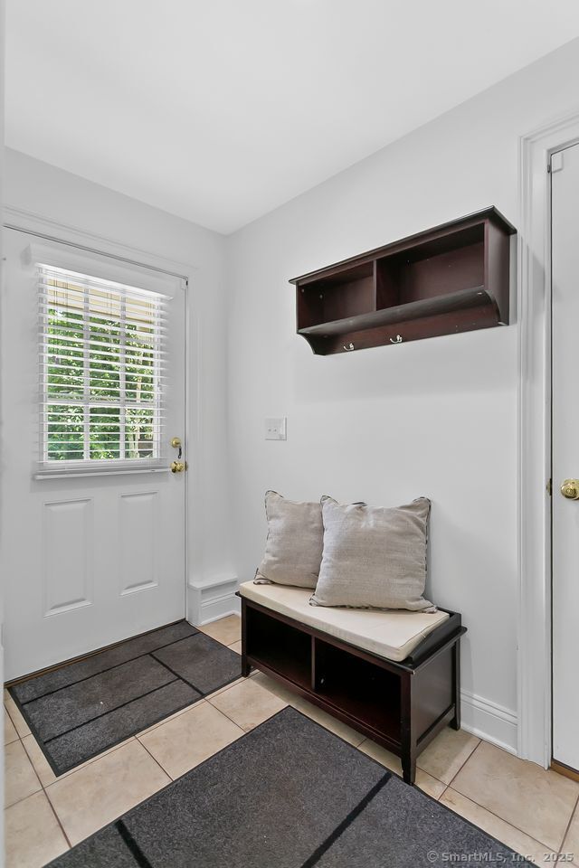 20 Aspen Mill Rd, Ridgefield, CT 06877 - mudroom with light tile patterned floors
