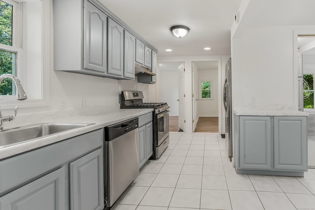 37 Quarry Rd, Beacon Falls, CT 06403 - kitchen featuring appliances with stainless steel finishes, gray cabinets, under cabinet range hood, light tile patterned floors, and recessed lighting