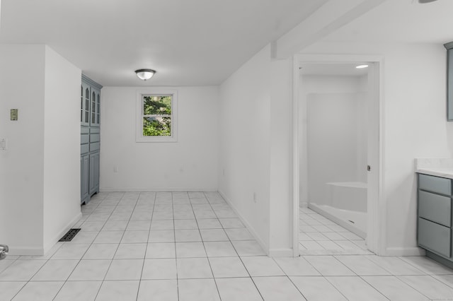 37 Quarry Rd, Beacon Falls, CT 06403 - empty room featuring light tile patterned flooring and baseboards