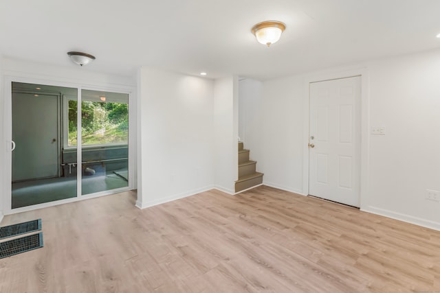 37 Quarry Rd, Beacon Falls, CT 06403 - spare room with wood finished floors, stairway, and recessed lighting