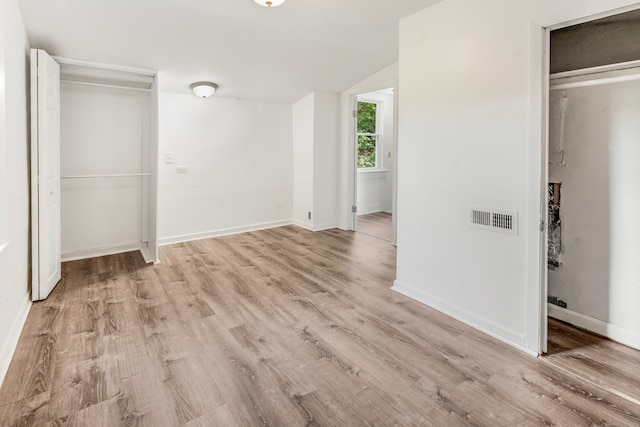 37 Quarry Rd, Beacon Falls, CT 06403 - unfurnished bedroom featuring light wood-style flooring, lofted ceiling, and a closet
