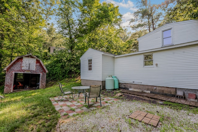 37 Quarry Rd, Beacon Falls, CT 06403 - view of green lawn featuring a patio and an outdoor structure
