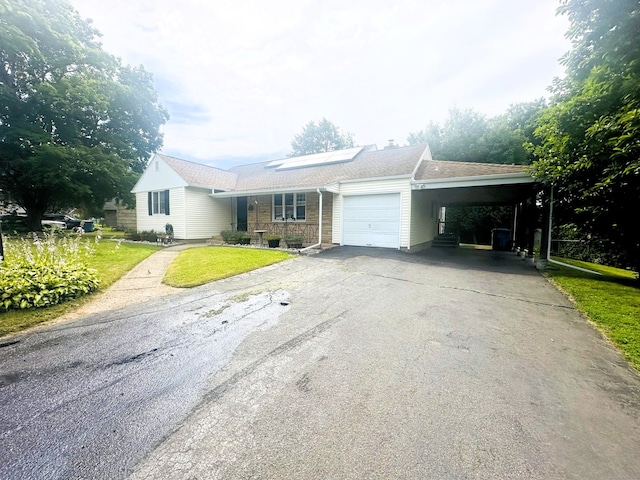 78 French St, Bristol, CT 06010 - ranch-style home featuring asphalt driveway, an attached carport, a front yard, and a garage