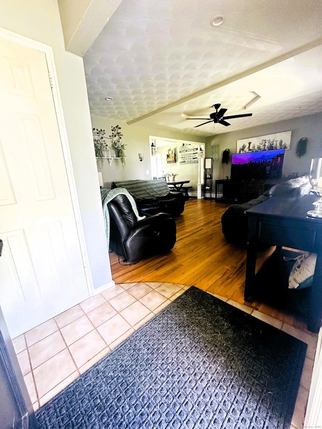 78 French St, Bristol, CT 06010 - tiled living area featuring ceiling fan and baseboards