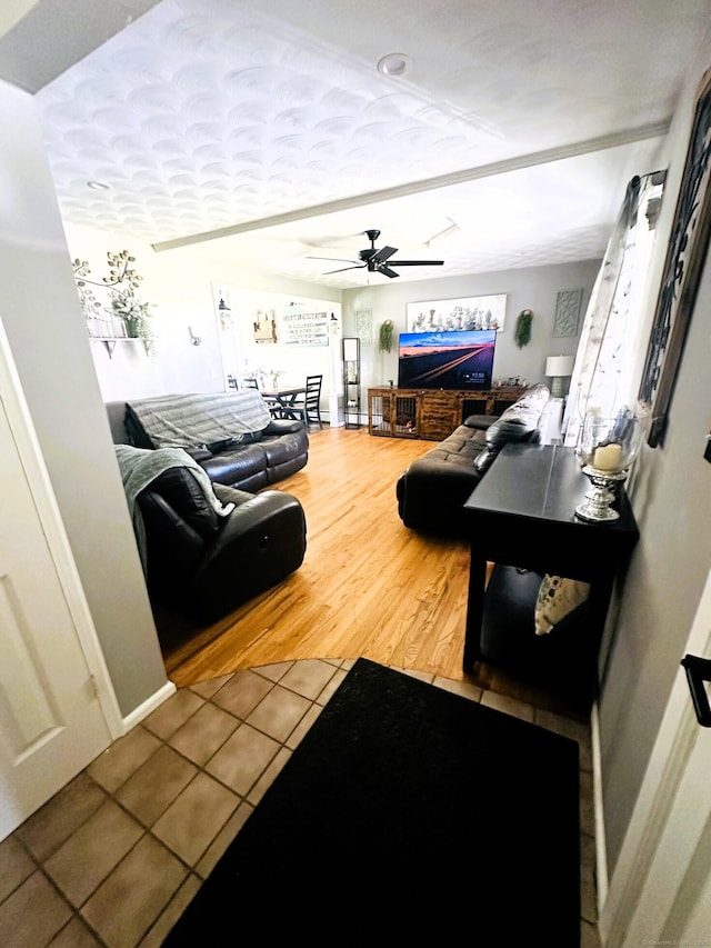 78 French St, Bristol, CT 06010 - living area featuring a ceiling fan and tile patterned flooring