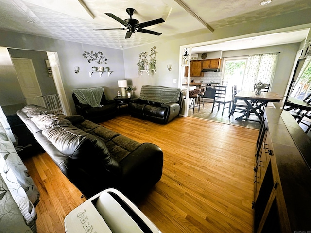 78 French St, Bristol, CT 06010 - living area featuring light wood-type flooring and ceiling fan