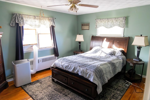 78 French St, Bristol, CT 06010 - bedroom featuring radiator heating unit, wood finished floors, and a ceiling fan