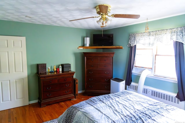 78 French St, Bristol, CT 06010 - bedroom featuring radiator heating unit, wood finished floors, and ceiling fan