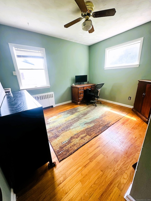 78 French St, Bristol, CT 06010 - office area with radiator, wood finished floors, and a ceiling fan
