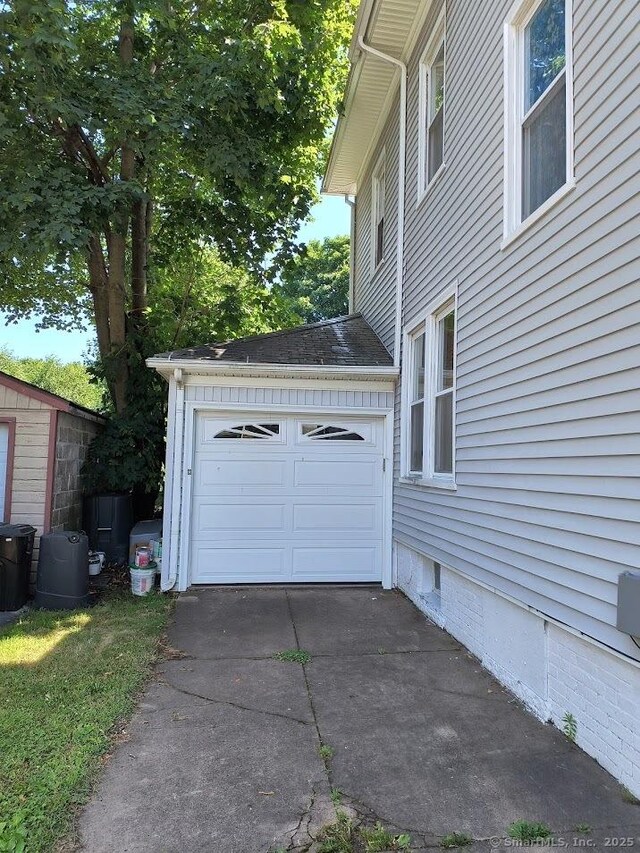 463 Washington Ave, West Haven, CT 06516 - garage featuring driveway