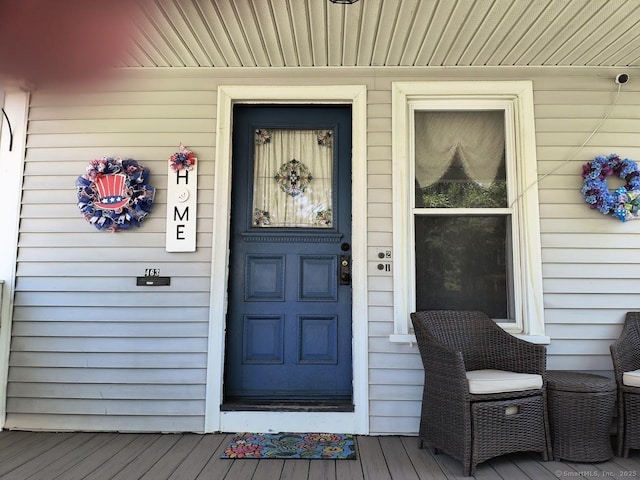 463 Washington Ave, West Haven, CT 06516 - doorway to property featuring covered porch and a security system