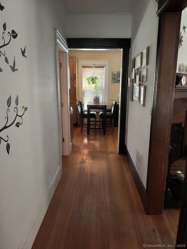 463 Washington Ave, West Haven, CT 06516 - corridor with hardwood / wood-style floors and baseboards