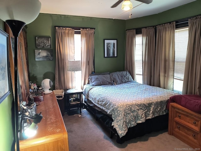 463 Washington Ave, West Haven, CT 06516 - carpeted bedroom featuring multiple windows and ceiling fan