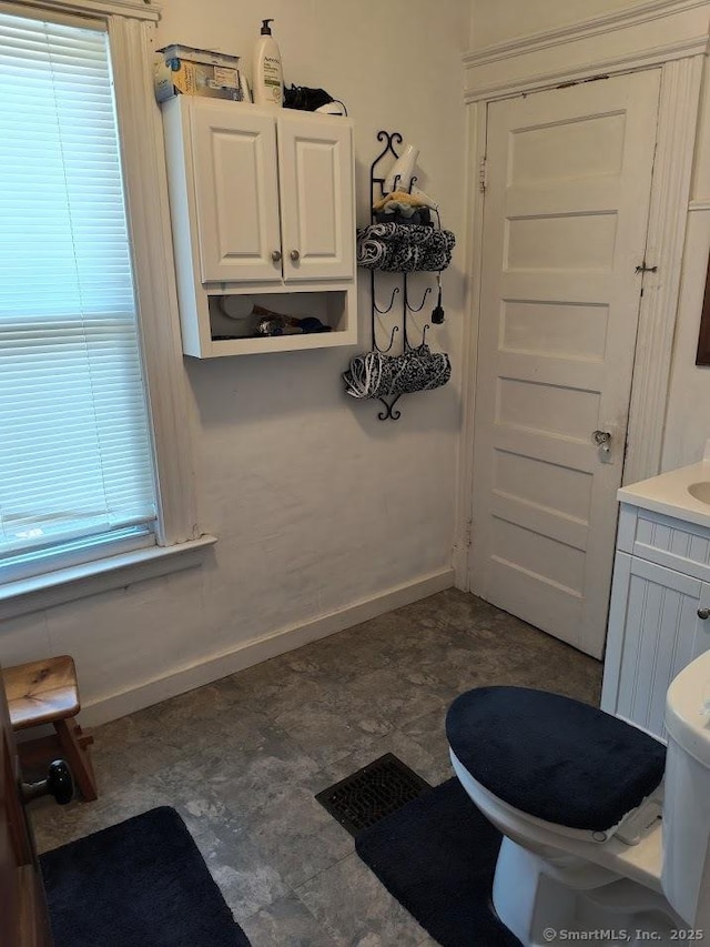 463 Washington Ave, West Haven, CT 06516 - bathroom featuring baseboards and vanity