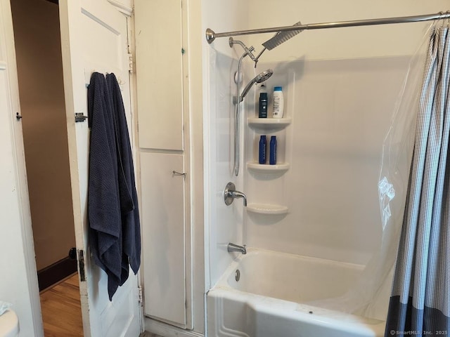 463 Washington Ave, West Haven, CT 06516 - bathroom featuring shower / bath combination with curtain and wood finished floors