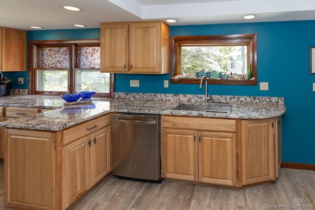 105 Beckett Ave Unit 105, Branford, CT 06405 - kitchen featuring dishwasher, light stone counters, light wood-style floors, recessed lighting, and a peninsula
