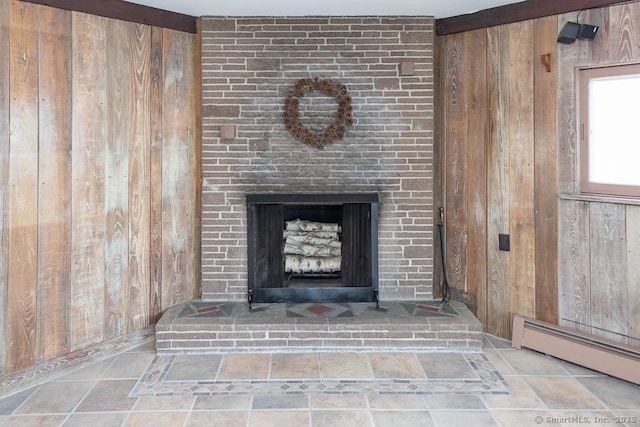 105 Beckett Ave Unit 105, Branford, CT 06405 - detailed view of wooden walls, a baseboard radiator, and a fireplace