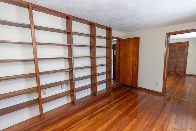 105 Beckett Ave Unit 105, Branford, CT 06405 - spare room featuring hardwood / wood-style floors and baseboards