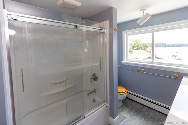 105 Beckett Ave Unit 105, Branford, CT 06405 - full bathroom with a baseboard heating unit, wood finished floors, and combined bath / shower with glass door