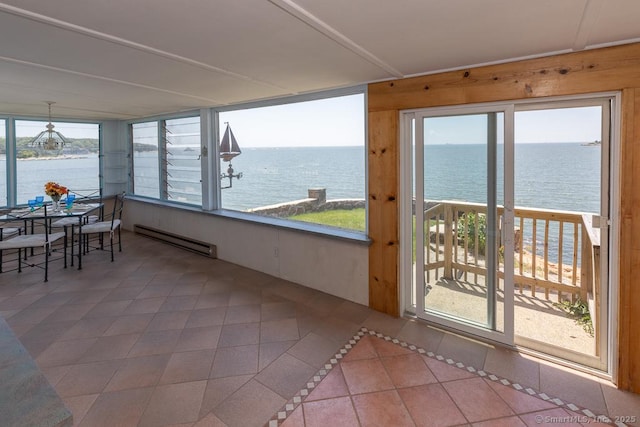 105 Beckett Ave Unit 105, Branford, CT 06405 - sunroom / solarium featuring baseboard heating, a water view, tile patterned floors, plenty of natural light, and wood walls