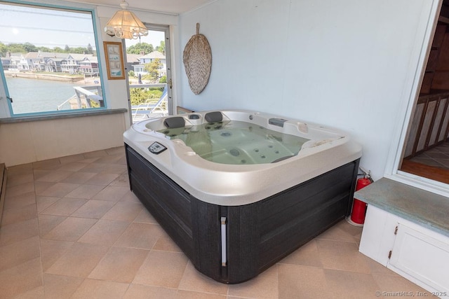105 Beckett Ave Unit 105, Branford, CT 06405 - misc room with a chandelier and a water view
