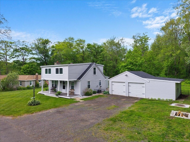 10 3rd Ave, Haddam, CT 06441 - view of front of house with an outbuilding, covered porch, a garage, a front yard, and a chimney