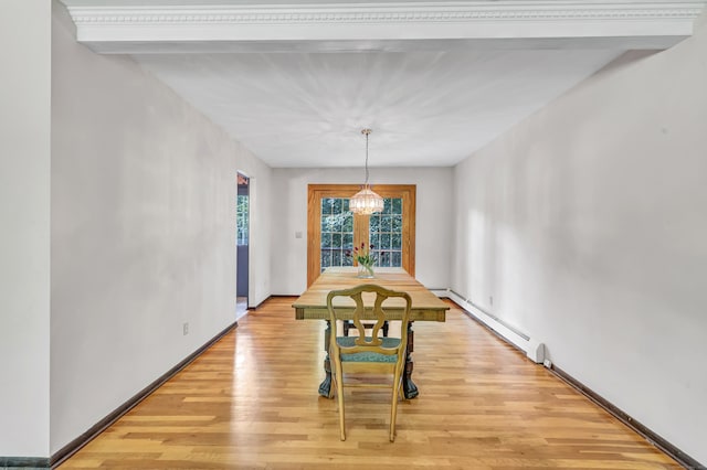 49 Nutmeg Ln, Shelton, CT 06484 - dining area with a baseboard heating unit, light wood finished floors, and a chandelier