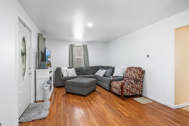 350 S Cherry St, Wallingford, CT 06492 - living area featuring light wood finished floors and baseboards