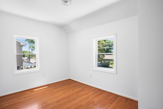 350 S Cherry St, Wallingford, CT 06492 - spare room with healthy amount of natural light, light wood-style flooring, and vaulted ceiling