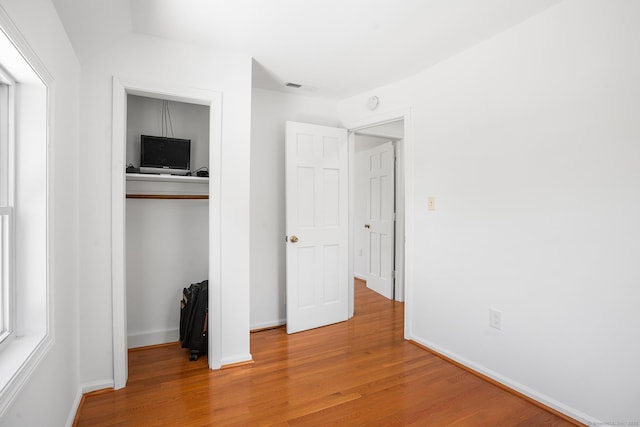 350 S Cherry St, Wallingford, CT 06492 - unfurnished bedroom featuring wood finished floors and a closet