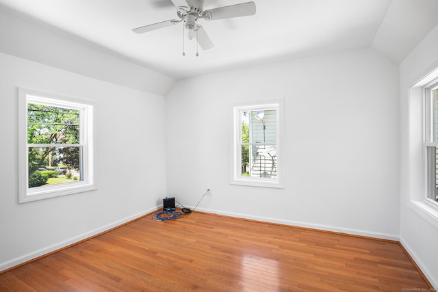 350 S Cherry St, Wallingford, CT 06492 - spare room featuring vaulted ceiling, healthy amount of natural light, wood finished floors, and ceiling fan