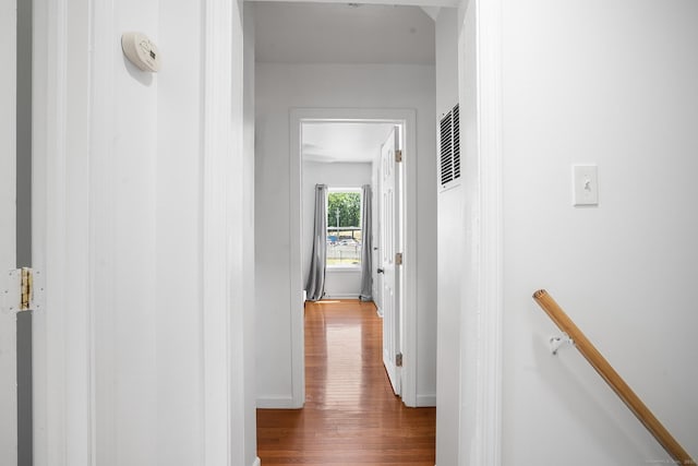 350 S Cherry St, Wallingford, CT 06492 - hallway featuring wood finished floors and an upstairs landing