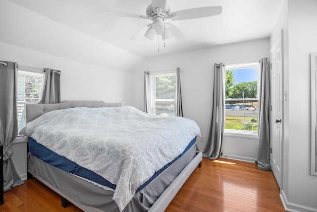 350 S Cherry St, Wallingford, CT 06492 - bedroom with wood finished floors, lofted ceiling, and ceiling fan