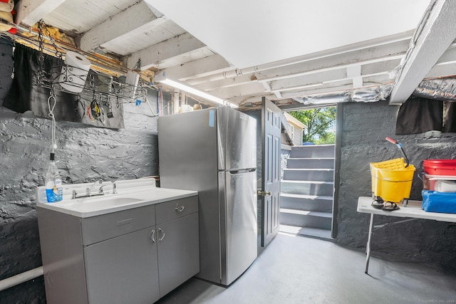 350 S Cherry St, Wallingford, CT 06492 - basement featuring freestanding refrigerator and a sink
