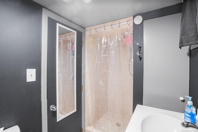 350 S Cherry St, Wallingford, CT 06492 - full bathroom featuring a shower stall and a sink