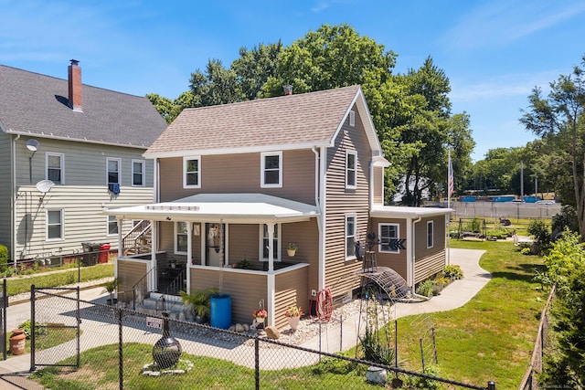 350 S Cherry St, Wallingford, CT 06492 - view of front of home featuring a porch, a fenced front yard, and a shingled roof