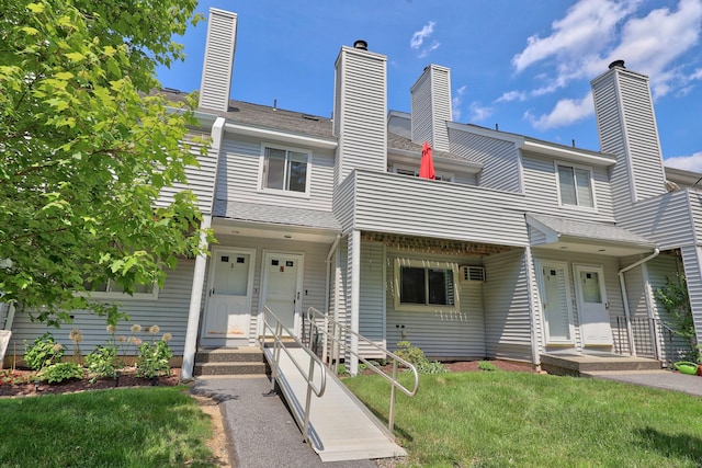 187 Lovers Ln Unit 4, Torrington, CT 06790 - multi unit property featuring a balcony, a front yard, and a chimney