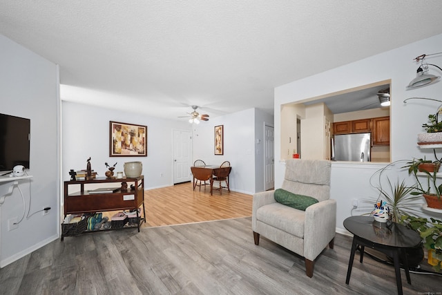 187 Lovers Ln Unit 4, Torrington, CT 06790 - living room with a ceiling fan and light wood-style flooring