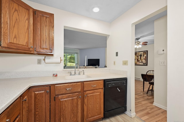 187 Lovers Ln Unit 4, Torrington, CT 06790 - kitchen featuring black dishwasher, light wood finished floors, light countertops, brown cabinets, and ceiling fan