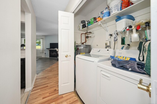 187 Lovers Ln Unit 4, Torrington, CT 06790 - washroom with light wood finished floors, separate washer and dryer, and gas water heater