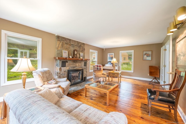 79 Ben Whitney Ln, Bridgewater, CT 06752 - living room with hardwood / wood-style flooring and a fireplace
