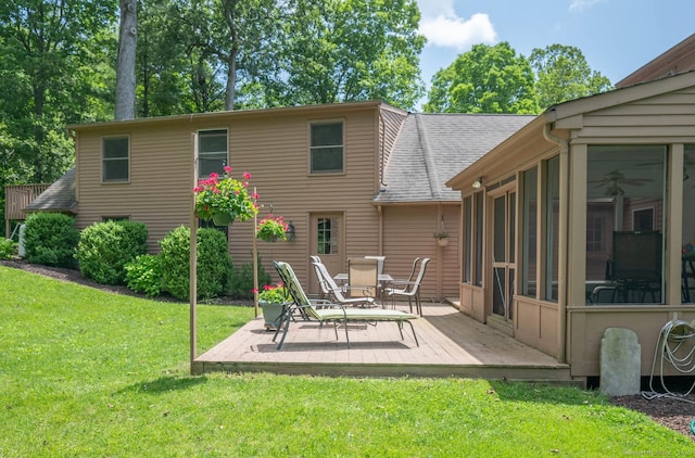 79 Ben Whitney Ln, Bridgewater, CT 06752 - rear view of house with a sunroom, a yard, and roof with shingles