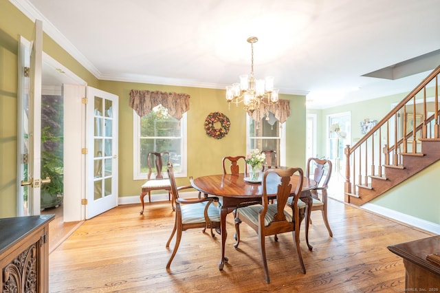 79 Ben Whitney Ln, Bridgewater, CT 06752 - dining space with a chandelier, stairway, light wood-type flooring, french doors, and ornamental molding