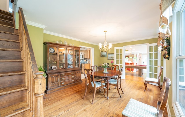 79 Ben Whitney Ln, Bridgewater, CT 06752 - dining area featuring a chandelier, stairway, ornamental molding, and light wood-style floors
